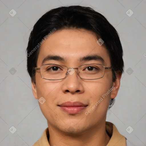 Joyful asian young-adult male with short  black hair and brown eyes