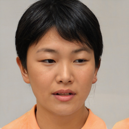 Neutral asian young-adult female with short  brown hair and brown eyes