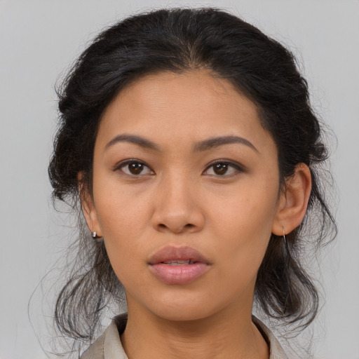 Neutral asian young-adult female with medium  brown hair and brown eyes