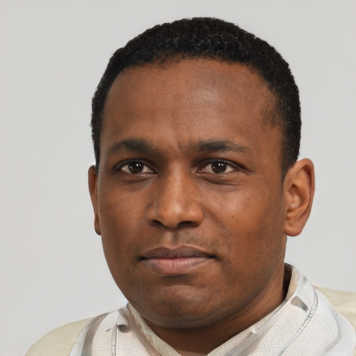 Neutral black adult male with short  black hair and brown eyes