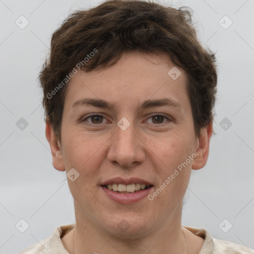 Joyful white young-adult female with short  brown hair and grey eyes