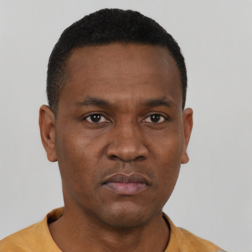 Neutral black young-adult male with short  brown hair and brown eyes