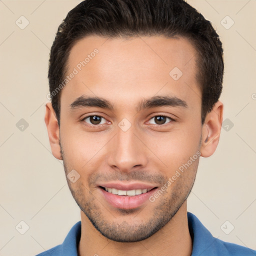 Joyful white young-adult male with short  brown hair and brown eyes