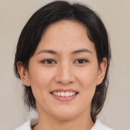 Joyful asian young-adult female with medium  brown hair and brown eyes