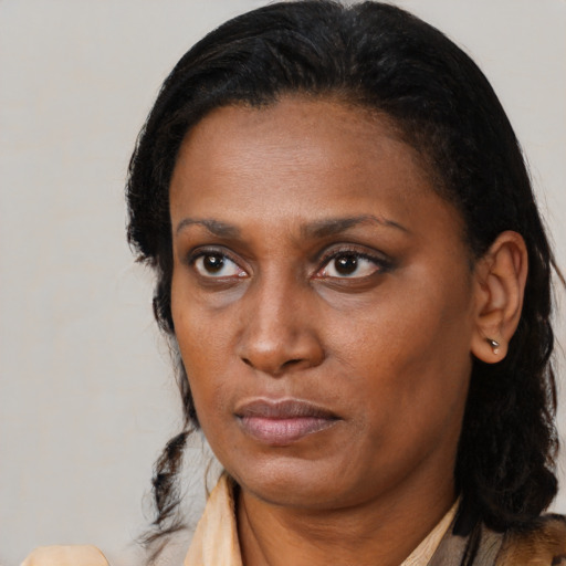 Neutral black adult female with long  black hair and brown eyes