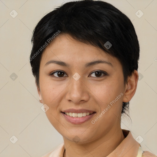 Joyful latino young-adult female with short  brown hair and brown eyes