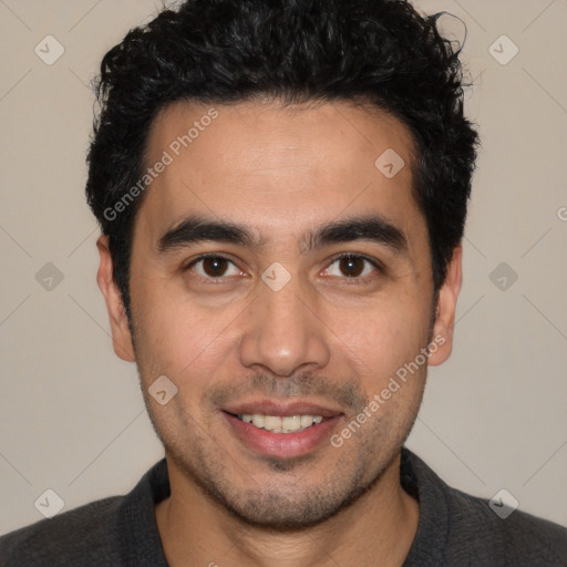 Joyful white young-adult male with short  black hair and brown eyes