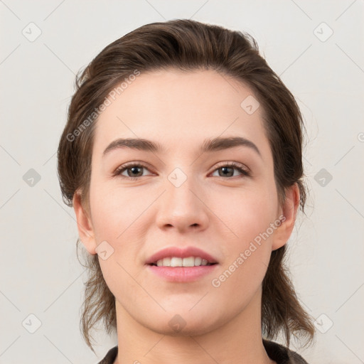 Joyful white young-adult female with medium  brown hair and brown eyes