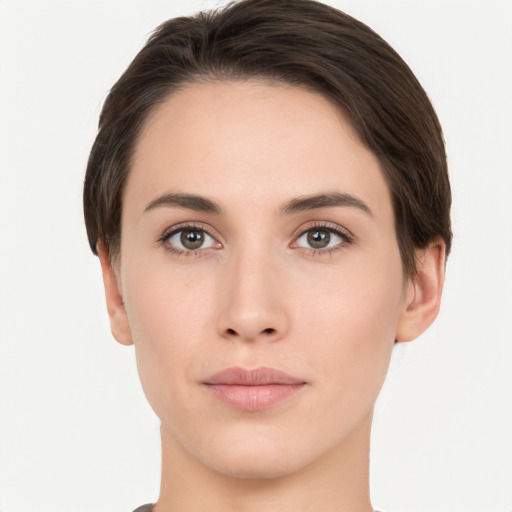 Neutral white young-adult female with short  brown hair and brown eyes