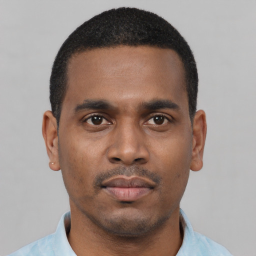 Neutral black young-adult male with short  black hair and brown eyes