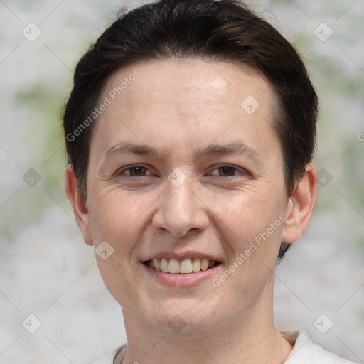 Joyful white adult female with short  brown hair and brown eyes