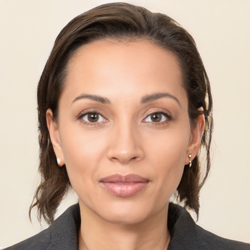 Joyful white young-adult female with medium  brown hair and brown eyes