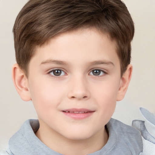 Joyful white child male with short  brown hair and brown eyes