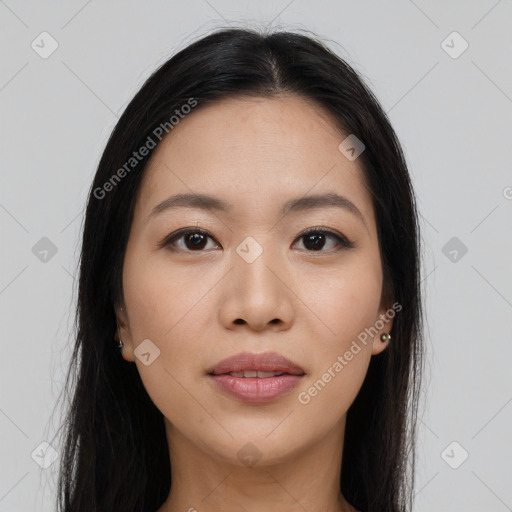 Joyful asian young-adult female with long  brown hair and brown eyes