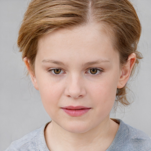 Joyful white child female with medium  brown hair and blue eyes