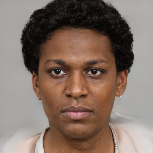 Neutral black young-adult female with short  brown hair and brown eyes