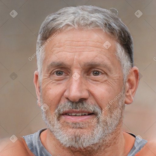 Neutral white middle-aged male with short  gray hair and brown eyes