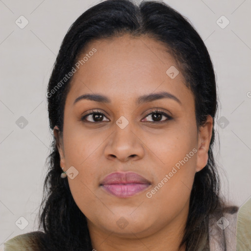 Joyful latino young-adult female with long  brown hair and brown eyes