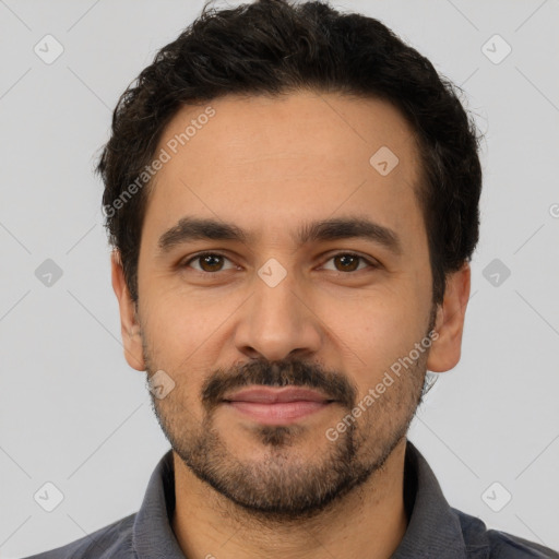 Joyful white young-adult male with short  black hair and brown eyes