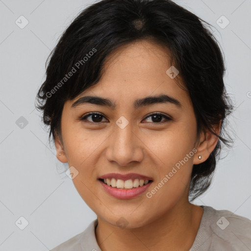 Joyful asian young-adult female with medium  brown hair and brown eyes