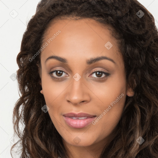 Joyful latino young-adult female with long  brown hair and brown eyes