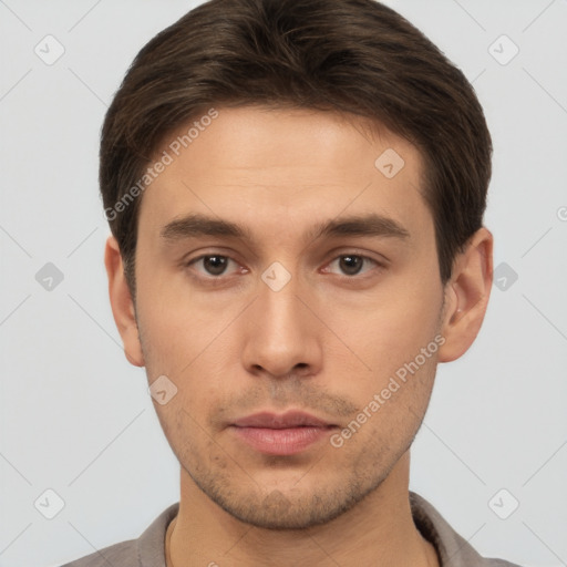 Neutral white young-adult male with short  brown hair and brown eyes