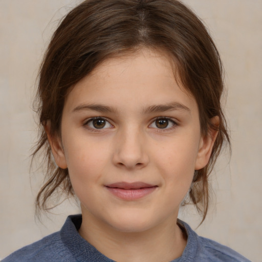 Joyful white child female with medium  brown hair and brown eyes