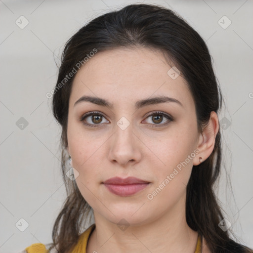 Neutral white young-adult female with long  brown hair and brown eyes