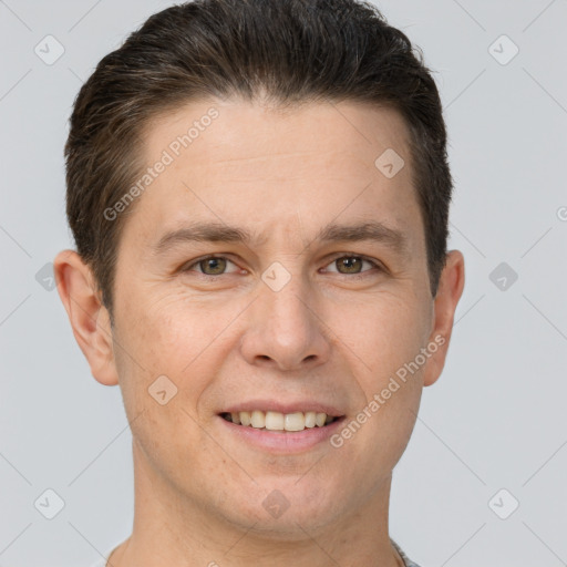 Joyful white adult male with short  brown hair and brown eyes