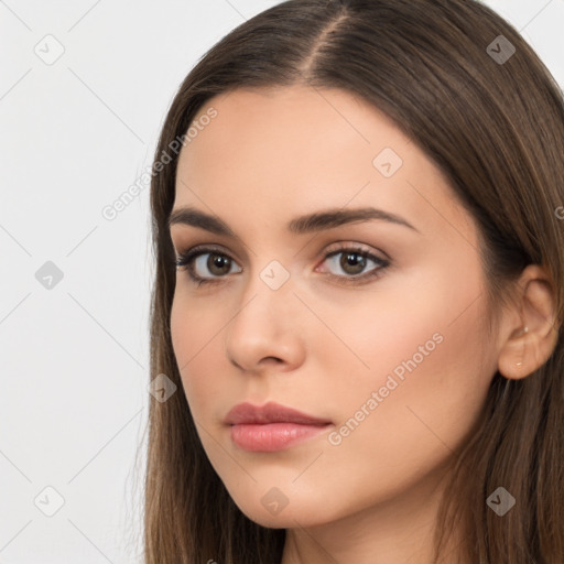 Neutral white young-adult female with long  brown hair and brown eyes