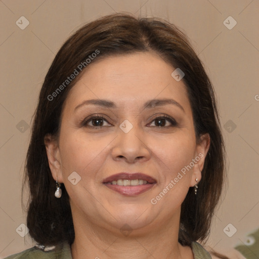 Joyful white adult female with medium  brown hair and brown eyes