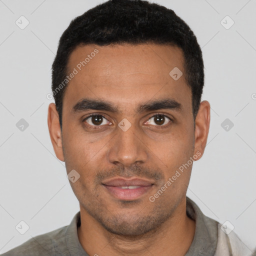 Joyful black young-adult male with short  black hair and brown eyes