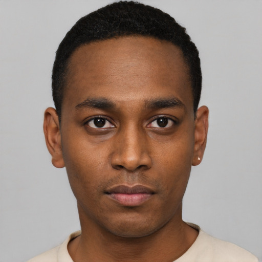 Neutral black young-adult male with short  black hair and brown eyes