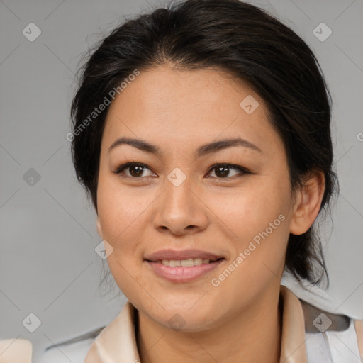 Joyful asian adult female with medium  brown hair and brown eyes