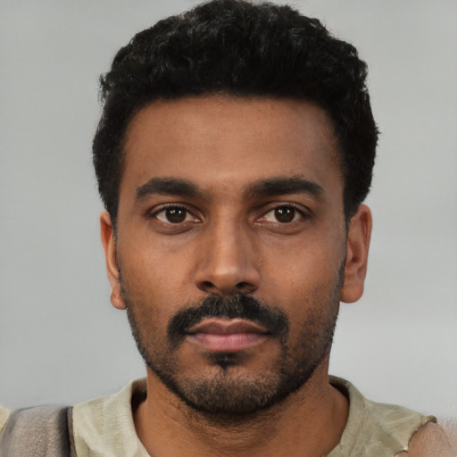 Neutral black young-adult male with short  black hair and brown eyes