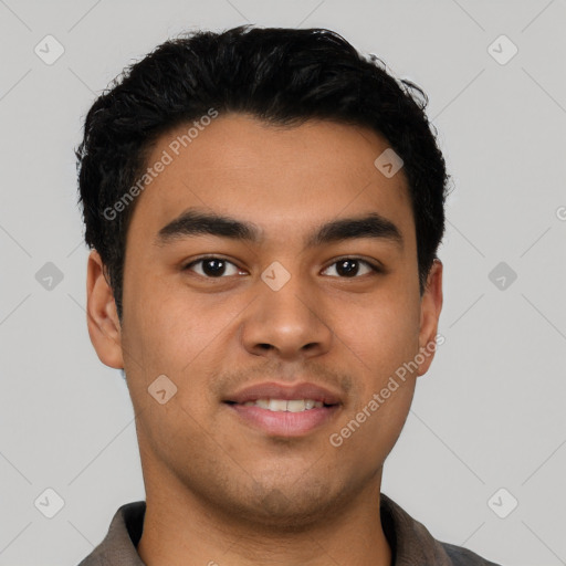 Joyful latino young-adult male with short  black hair and brown eyes