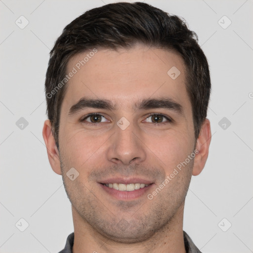 Joyful white young-adult male with short  brown hair and brown eyes