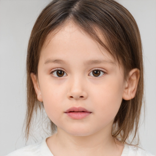 Neutral white child female with medium  brown hair and brown eyes