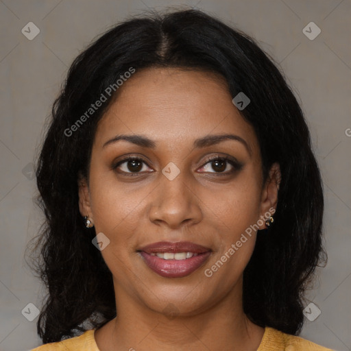 Joyful black young-adult female with medium  brown hair and brown eyes