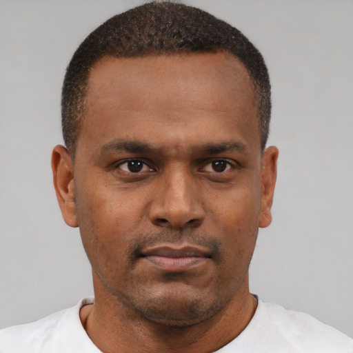 Neutral black young-adult male with short  brown hair and brown eyes