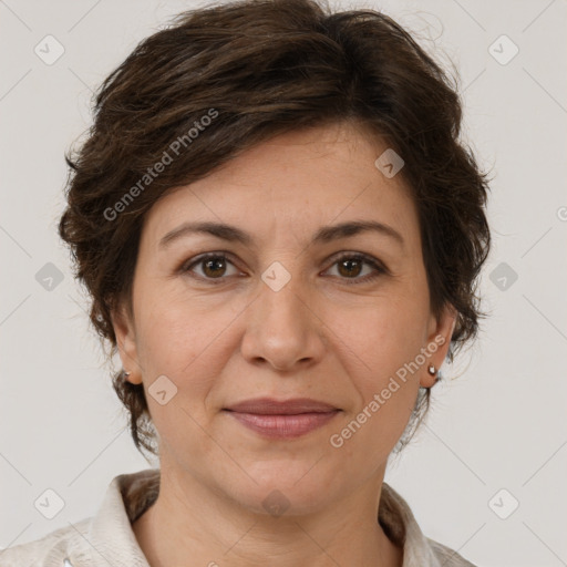 Joyful white adult female with short  brown hair and brown eyes