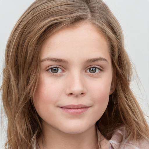 Joyful white child female with long  brown hair and brown eyes