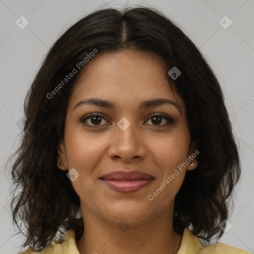 Joyful black young-adult female with medium  brown hair and brown eyes