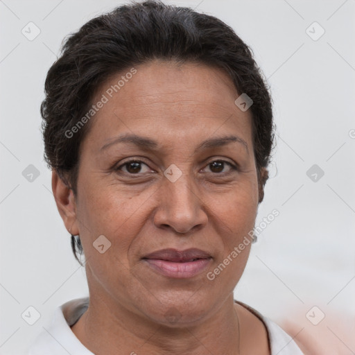 Joyful white adult female with short  brown hair and brown eyes