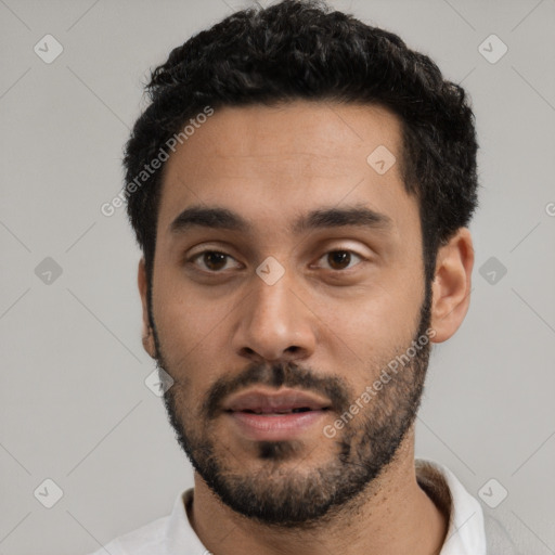 Neutral latino young-adult male with short  black hair and brown eyes