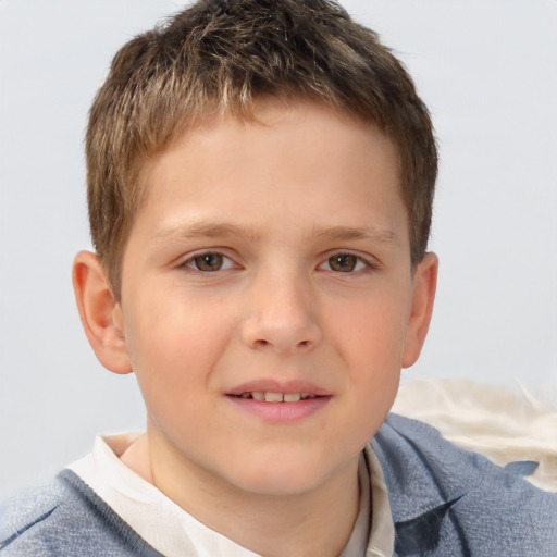 Joyful white child male with short  brown hair and brown eyes