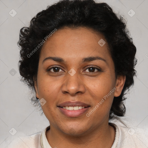 Joyful latino adult female with short  brown hair and brown eyes