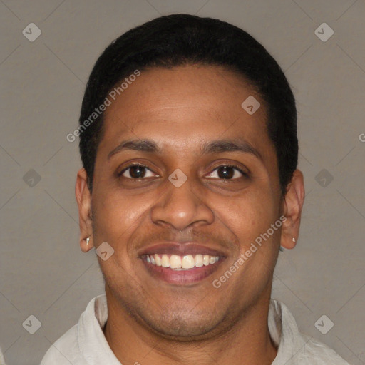 Joyful latino young-adult male with short  black hair and brown eyes