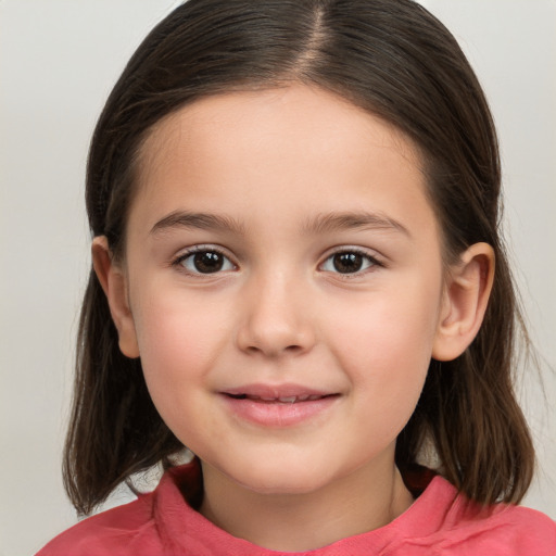 Joyful white child female with medium  brown hair and brown eyes