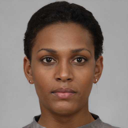 Neutral black young-adult female with short  black hair and brown eyes